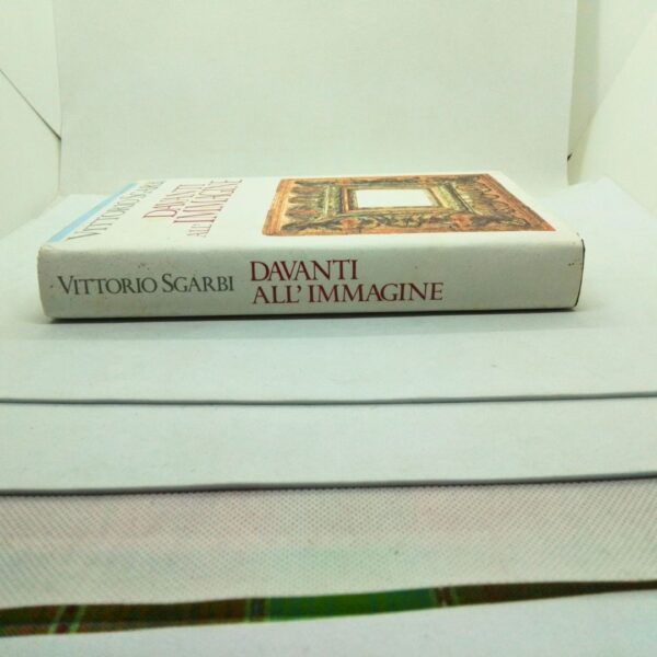 Libro davanti all immagine vittorio sgarbi 1989 lato destro ( costa)